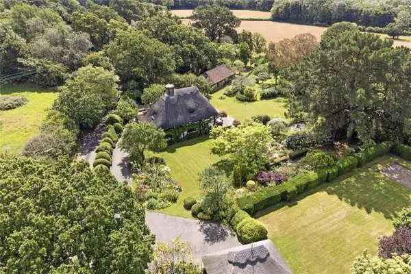 Charming Grade II Listed Thatched Property with Indoor Pool and Outbuildings