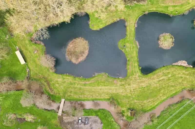 10.5 Acre Trout Fishery with 3 Lakes and River Access