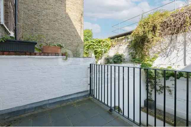 Terraced house for sale in Pembroke Square, London W8