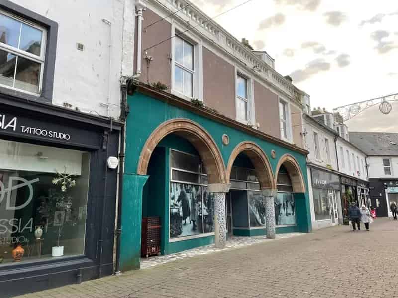 Two Story Town Centre Property with Retail Space and Flats