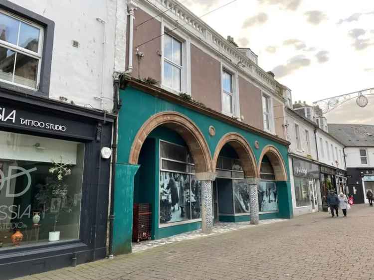 Two Story Town Centre Property with Retail Space and Flats