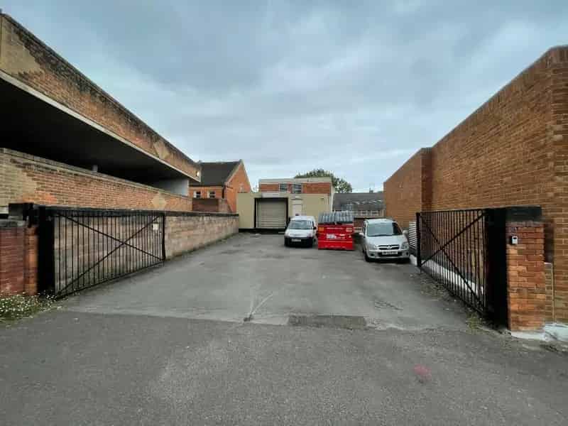 Three Story Commercial Property with Parking and Potential Residential Conversion