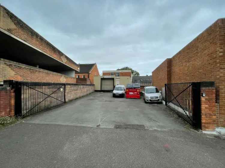 Three Story Commercial Property with Parking and Potential Residential Conversion