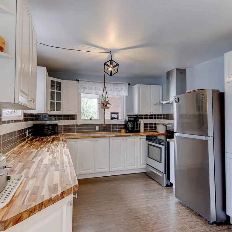 House for Sale 3 Beds Large Lot Heated Pool Garage