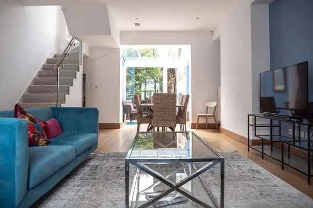 Terraced house to rent in Addison Avenue, London W11