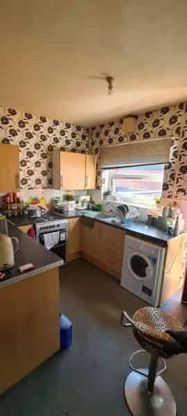 Two-Bedroom House Near Schools and Hospital