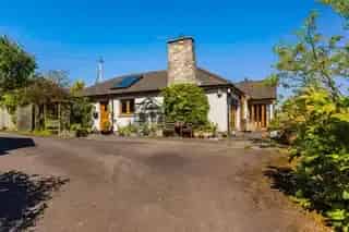 Spacious Detached Bungalow with Landscaped Gardens