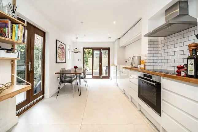 Terraced house for sale in Brewster Gardens, London W10