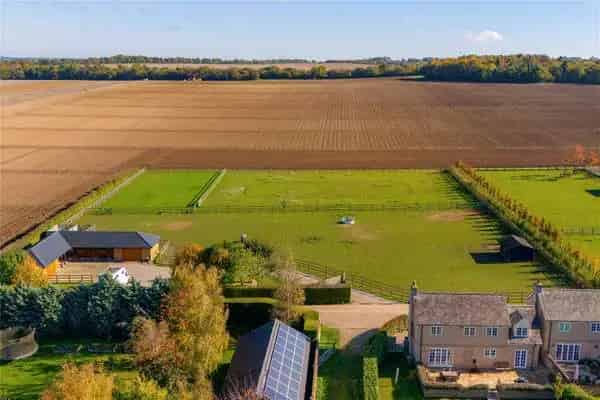 Modern Four-Bedroom Home with Stables and Paddocks