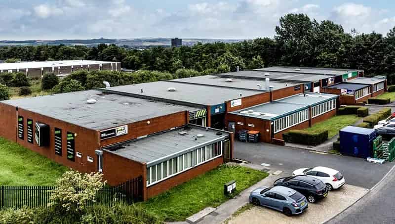 Industrial Units: Brick Exterior, Office Space, Ample Parking