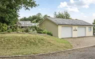 Spacious Converted Barn with Detached Garage and ¾ Acre Garden