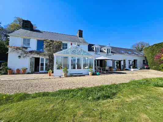 Charming Welsh Longhouse with Barn Conversion and Extensive Gardens
