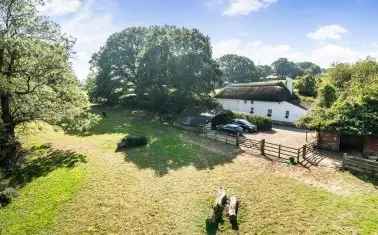 Grade II Listed Cottage with 4 Bedrooms and 0.73 Acres