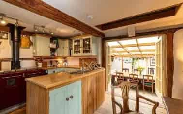 Historic Grade II Listed Farmhouse with Outbuildings and Extensive Land