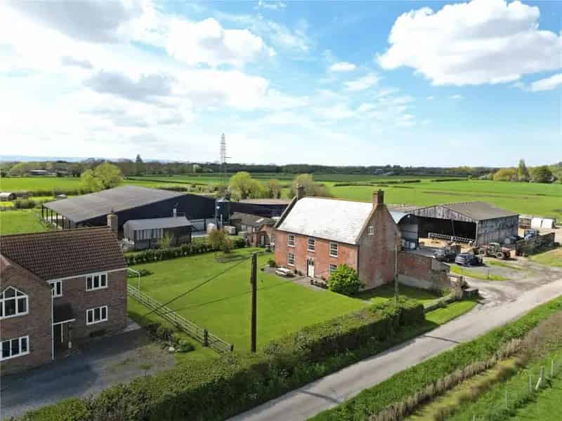4-Bedroom Farmhouse with Agricultural Buildings and Land