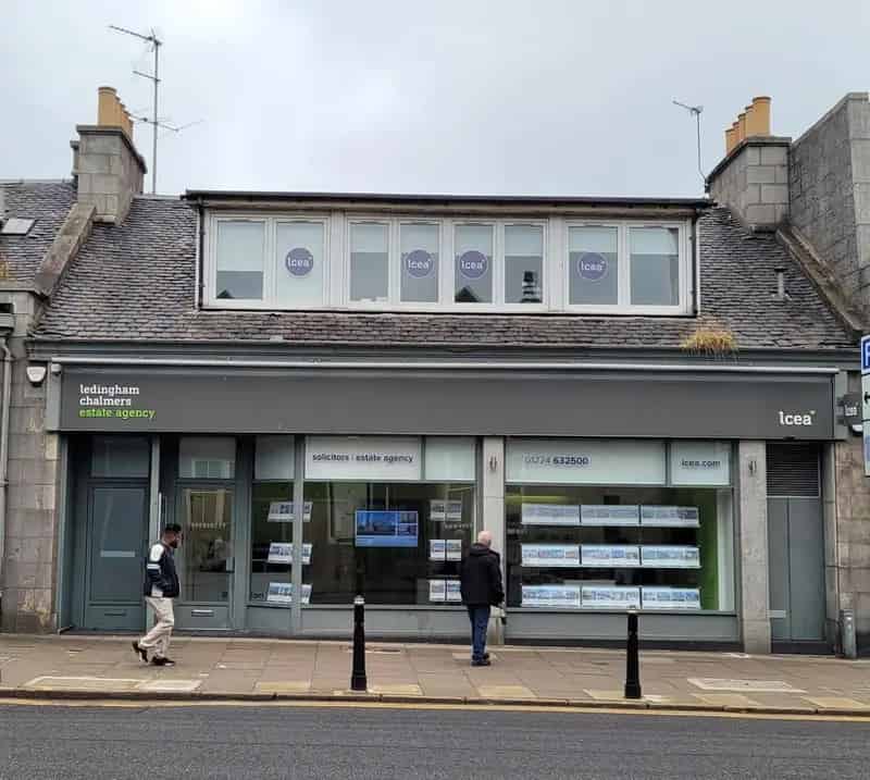 Mid Terraced Two Storey Granite Building with Rear Extension and Parking