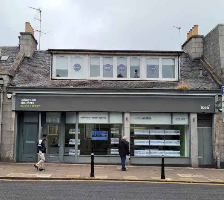 Mid-Terraced Granite Building with 7-Car Parking