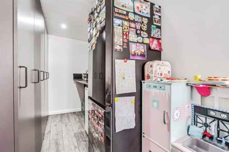 Family Home with Multiple Reception Rooms and Enclosed Garden