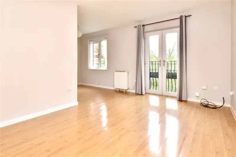 Bright 2-Bed Apartment with Parking Near Amenities