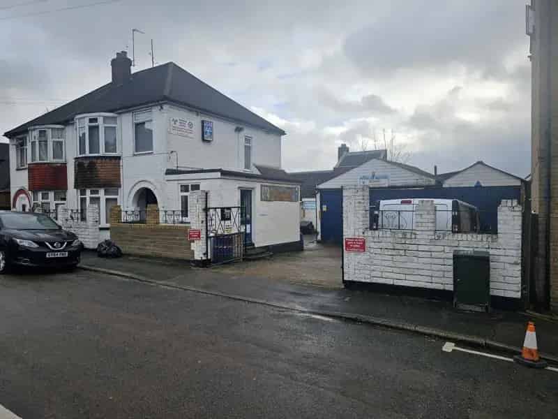 Semi-Detached House with MOT Station - Investment Opportunity