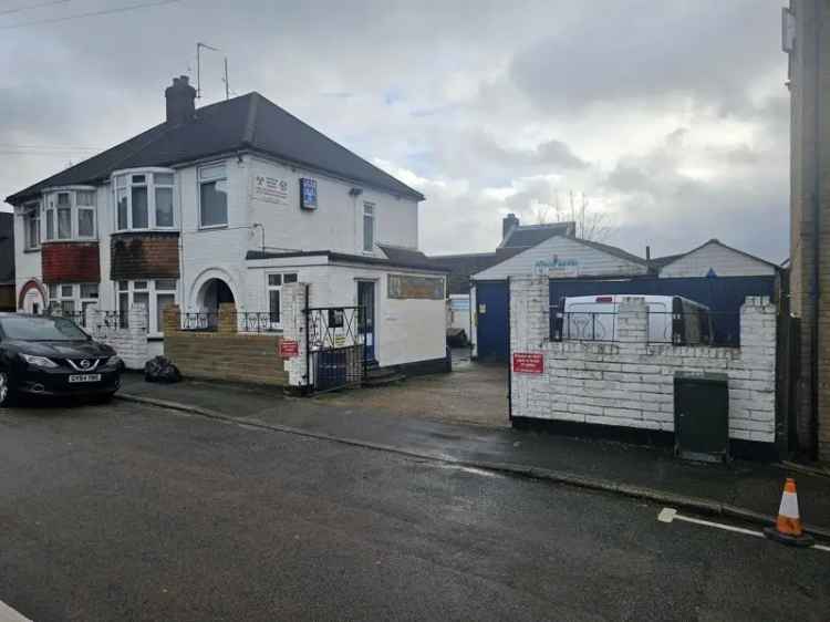 Semi Detached House with MOT Station and Rental Income