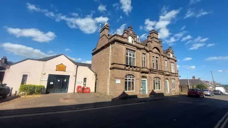 Stone Building with Office Space and Flat Redevelopment Opportunity