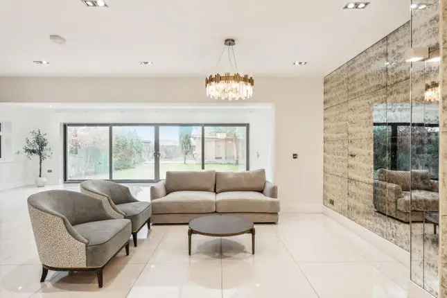 Detached house to rent in Coombe Gardens, Raynes Park, London SW20