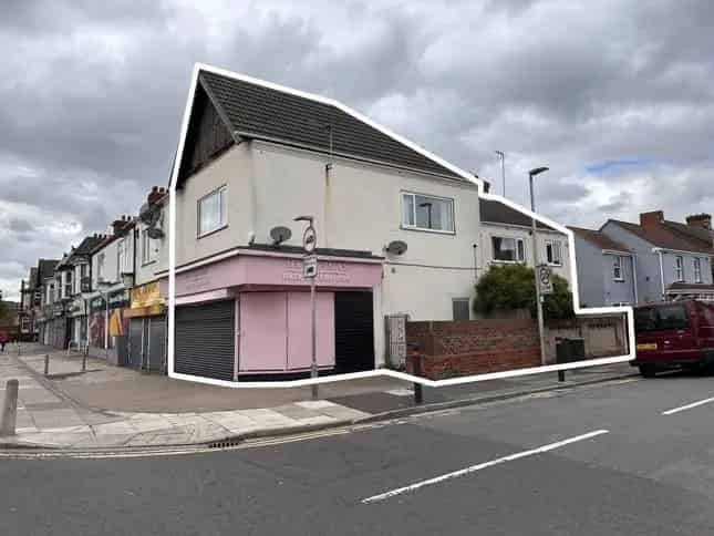 Mixed-Use Property with Retail Unit and Two Flats