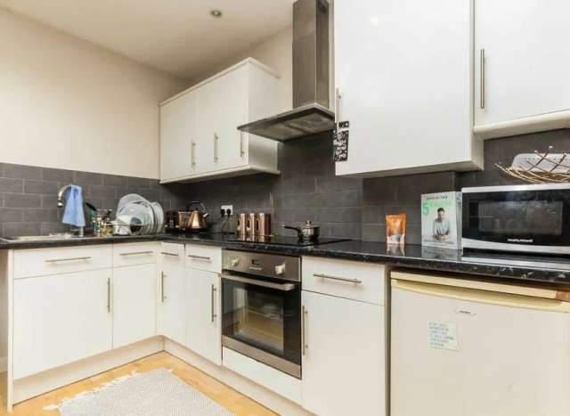 Flat For Sale in Elmbridge, England