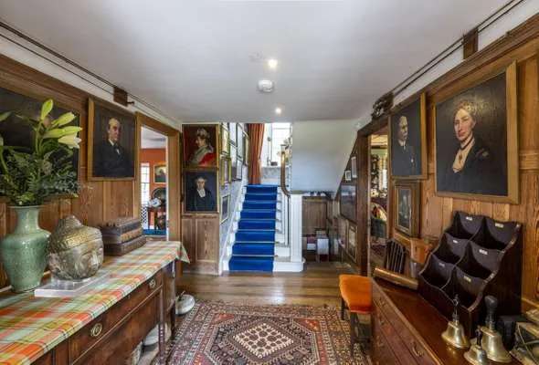 A Listed Mansion House with Cottages, Walled Garden, Loch, and Boathouse