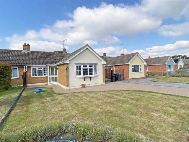 Extended Semi-Detached Bungalow with Two Bedrooms, Detached Garage and Driveway Parking